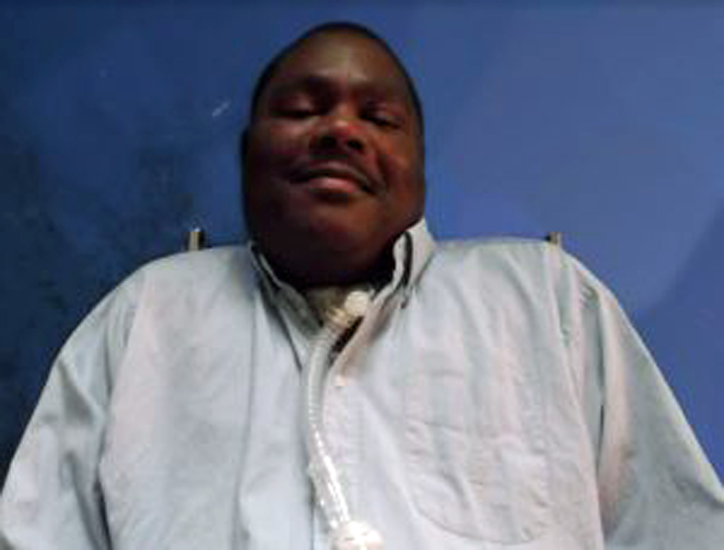 ventilator dependent quadriplegic man smiling