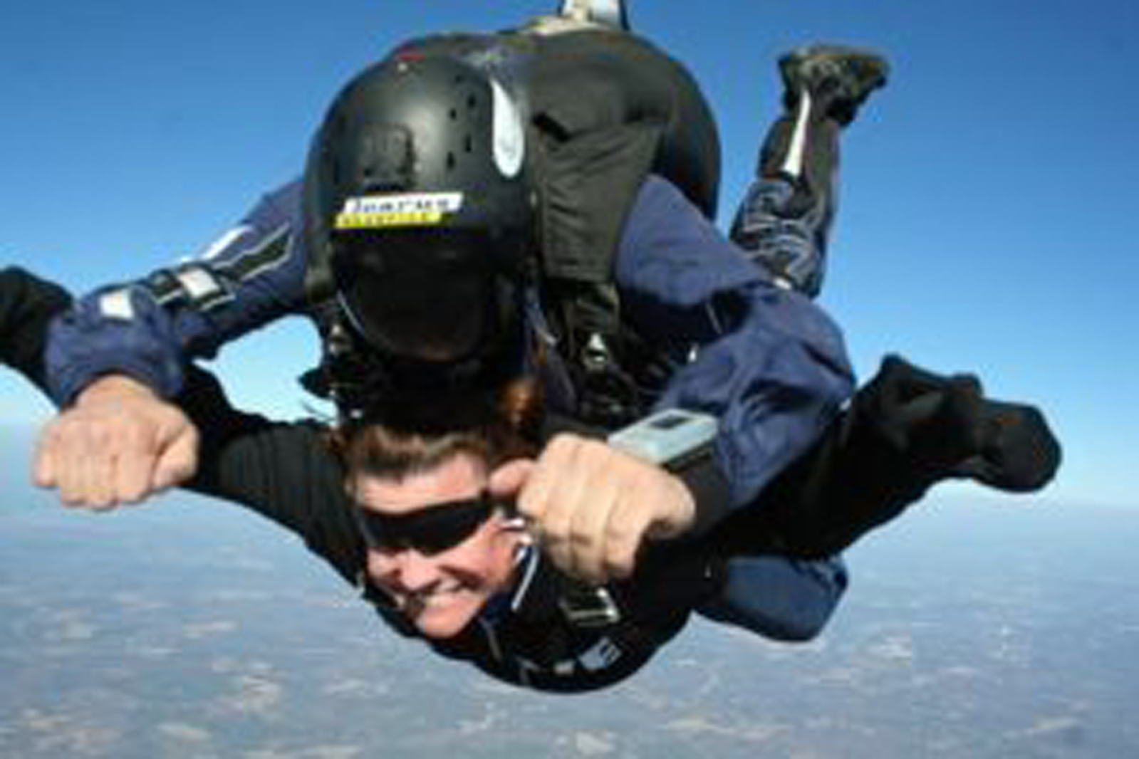two people tandem skydiving