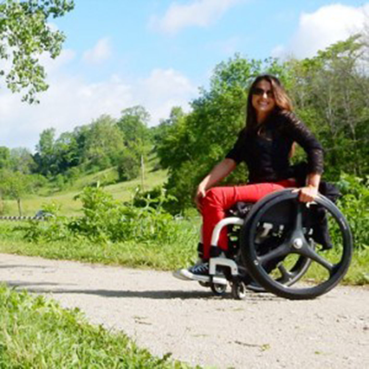 paraplegic woman in manual wheelchair