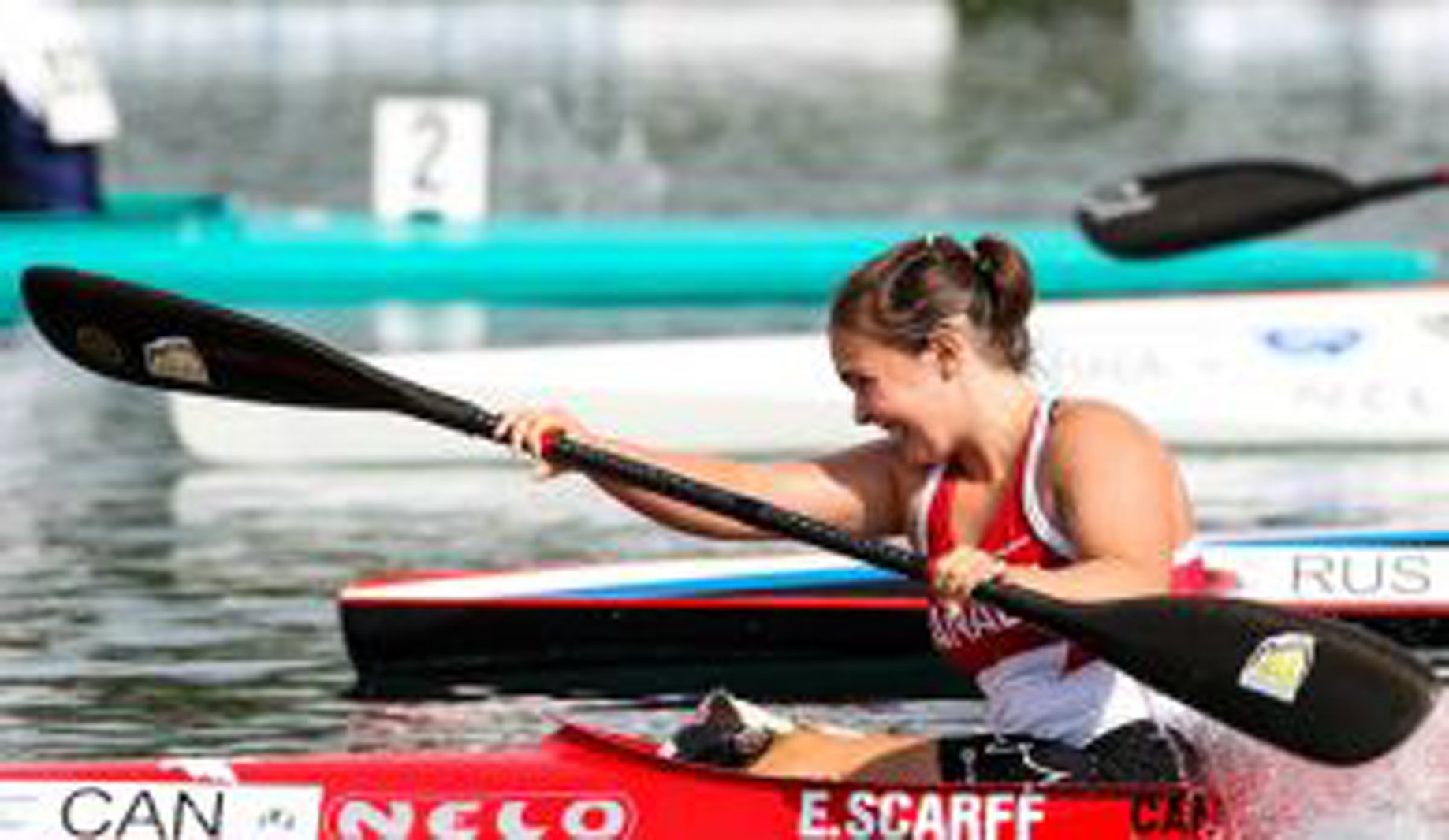 woman paddling a boat