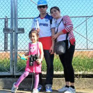 blind man with wife and daughter