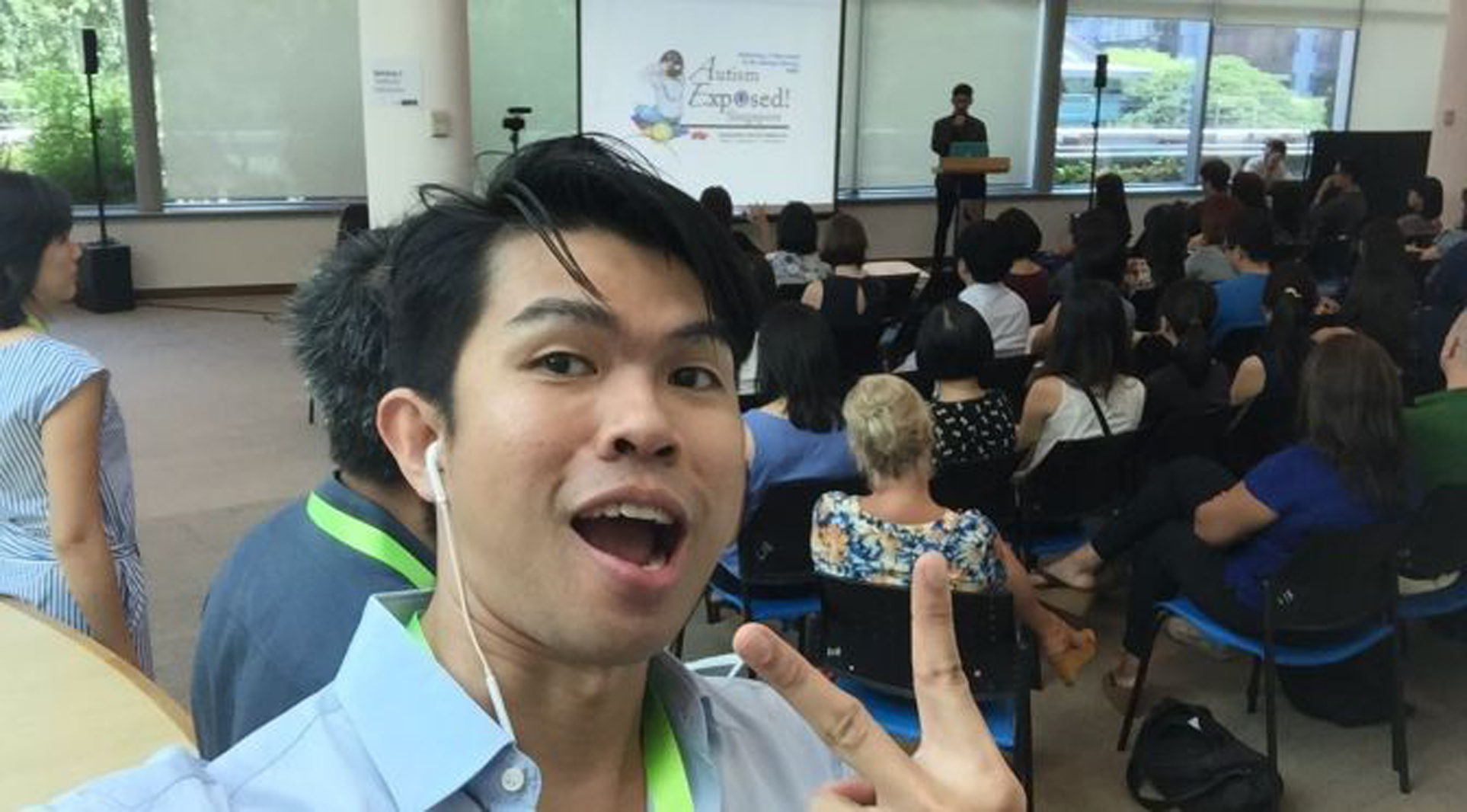 selfie with a man giving a thumbs up