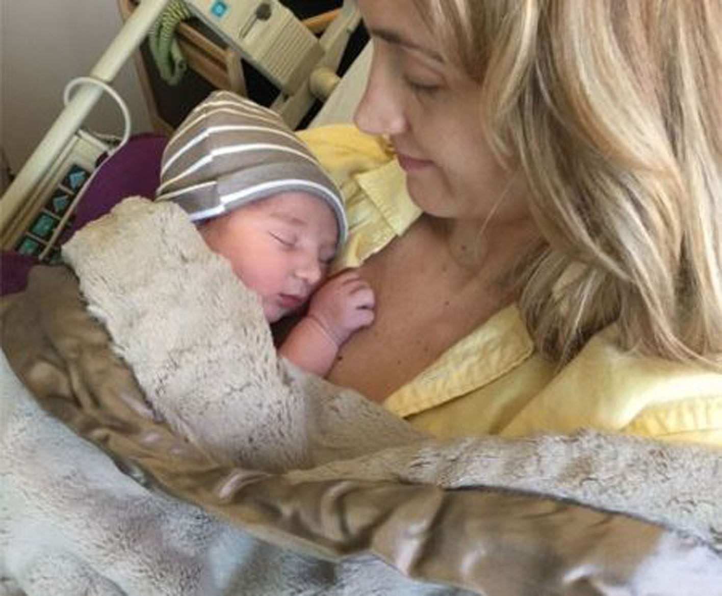 mom holding her newborn baby