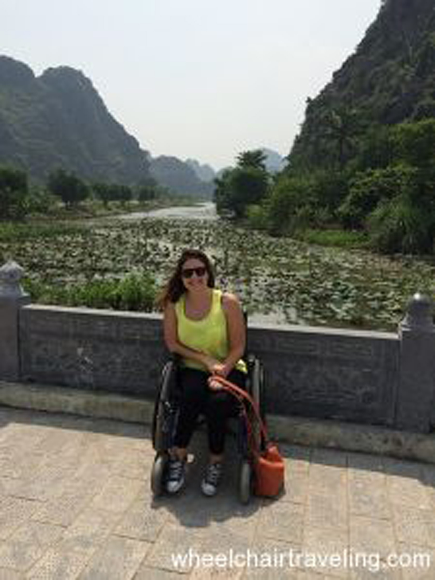 woman in manual wheelchair in vietnam