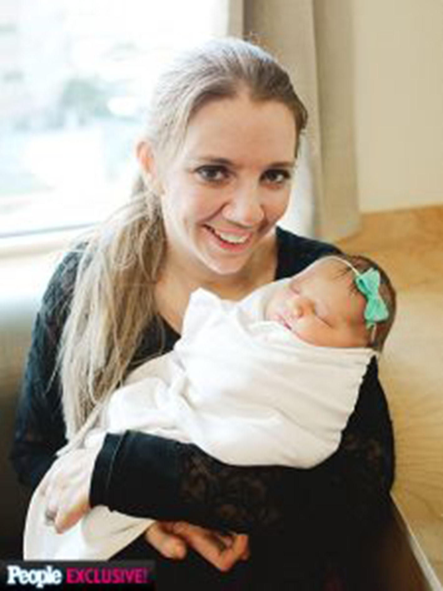 quadriplegic mom holding her infant daughter