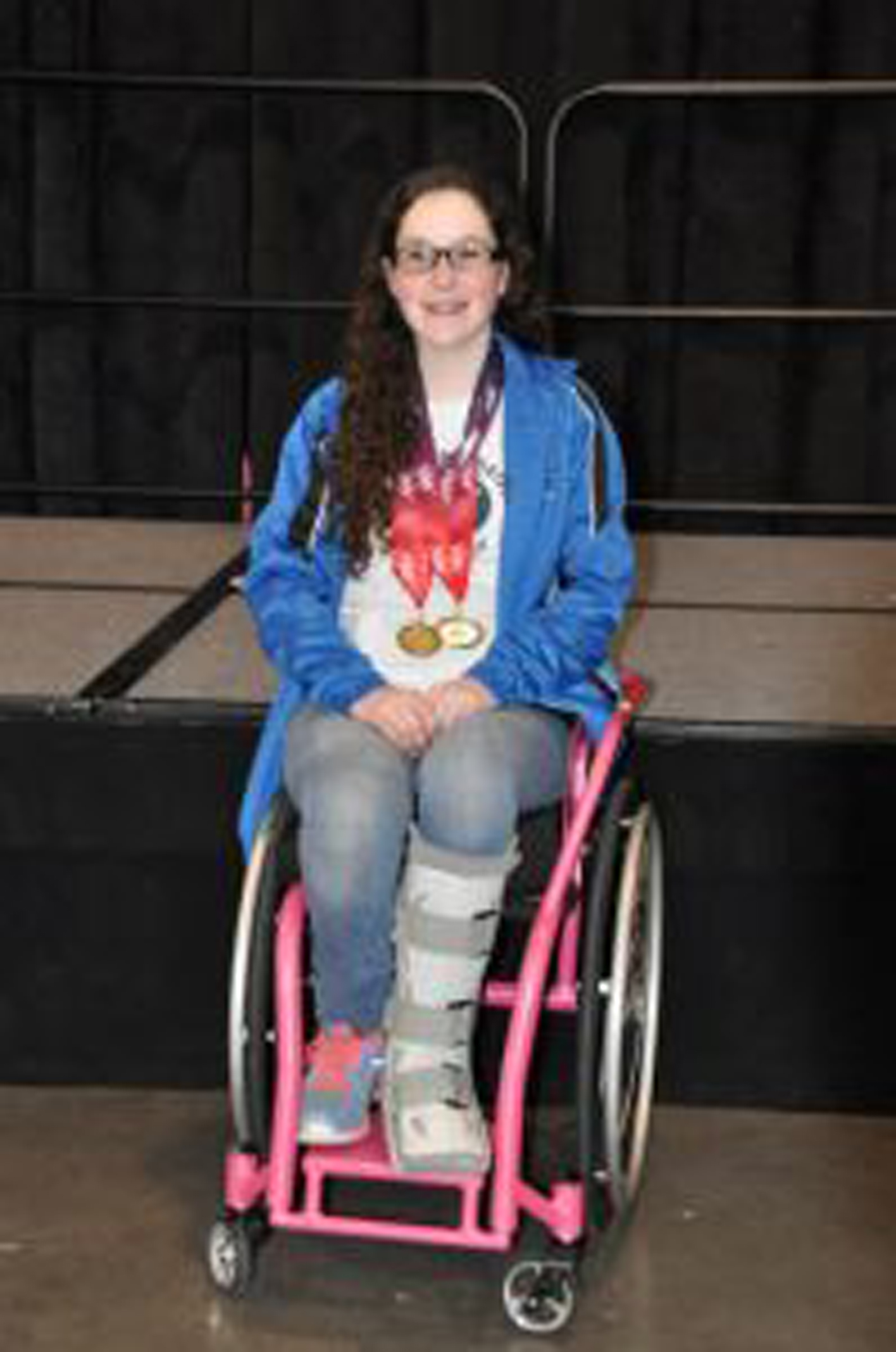 a young woman on a manual wheelchair