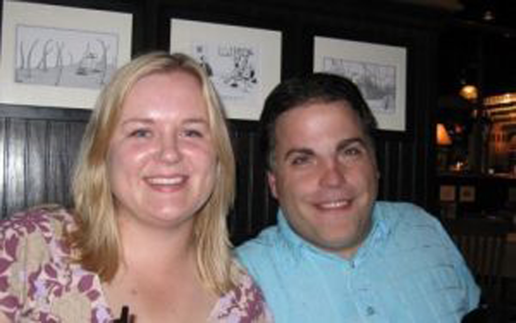 a man and woman smiling