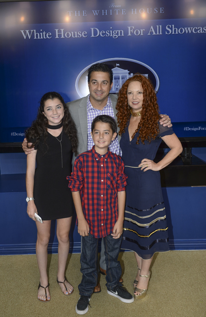 a family stands together at a White House event