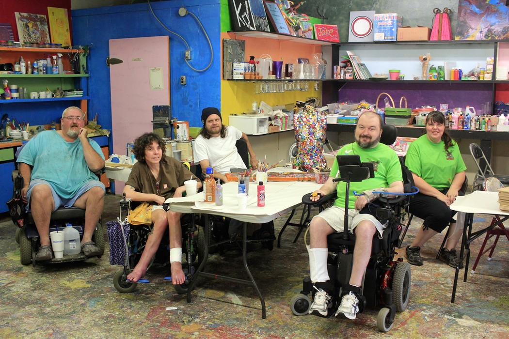 wheelchair users attend an art class