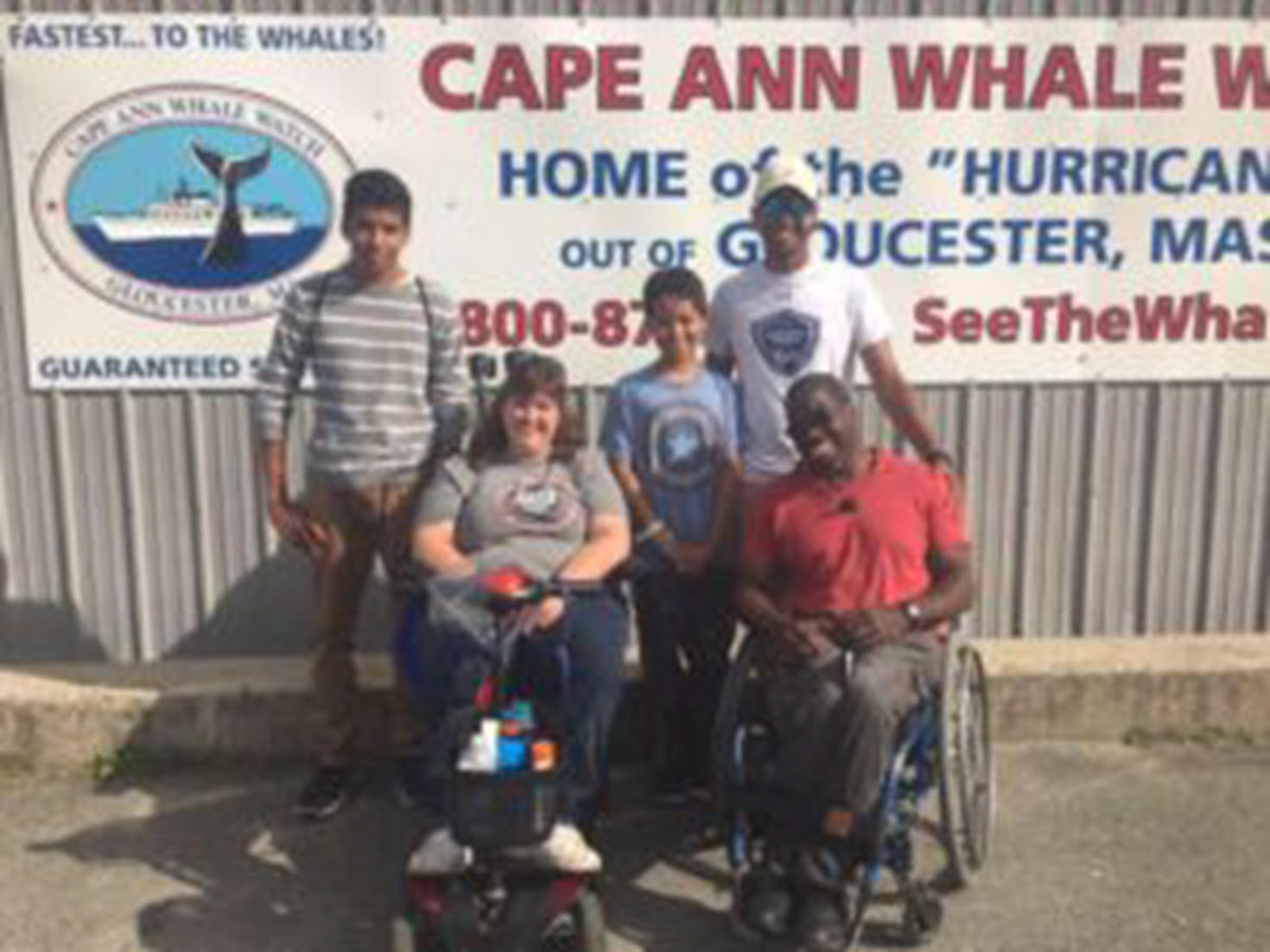 parents who are wheelchair users pose with their children