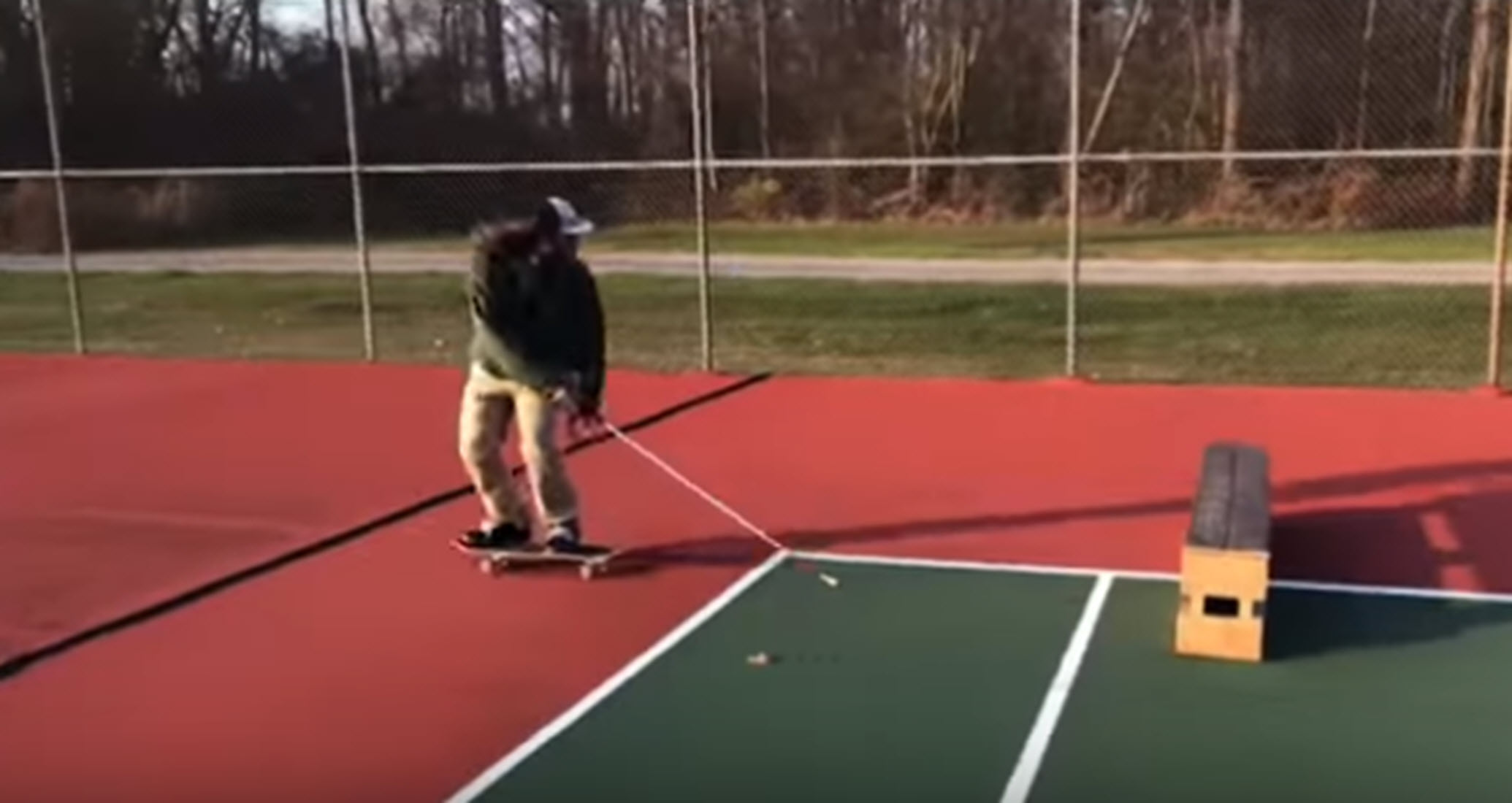 blind man rides a skateboard