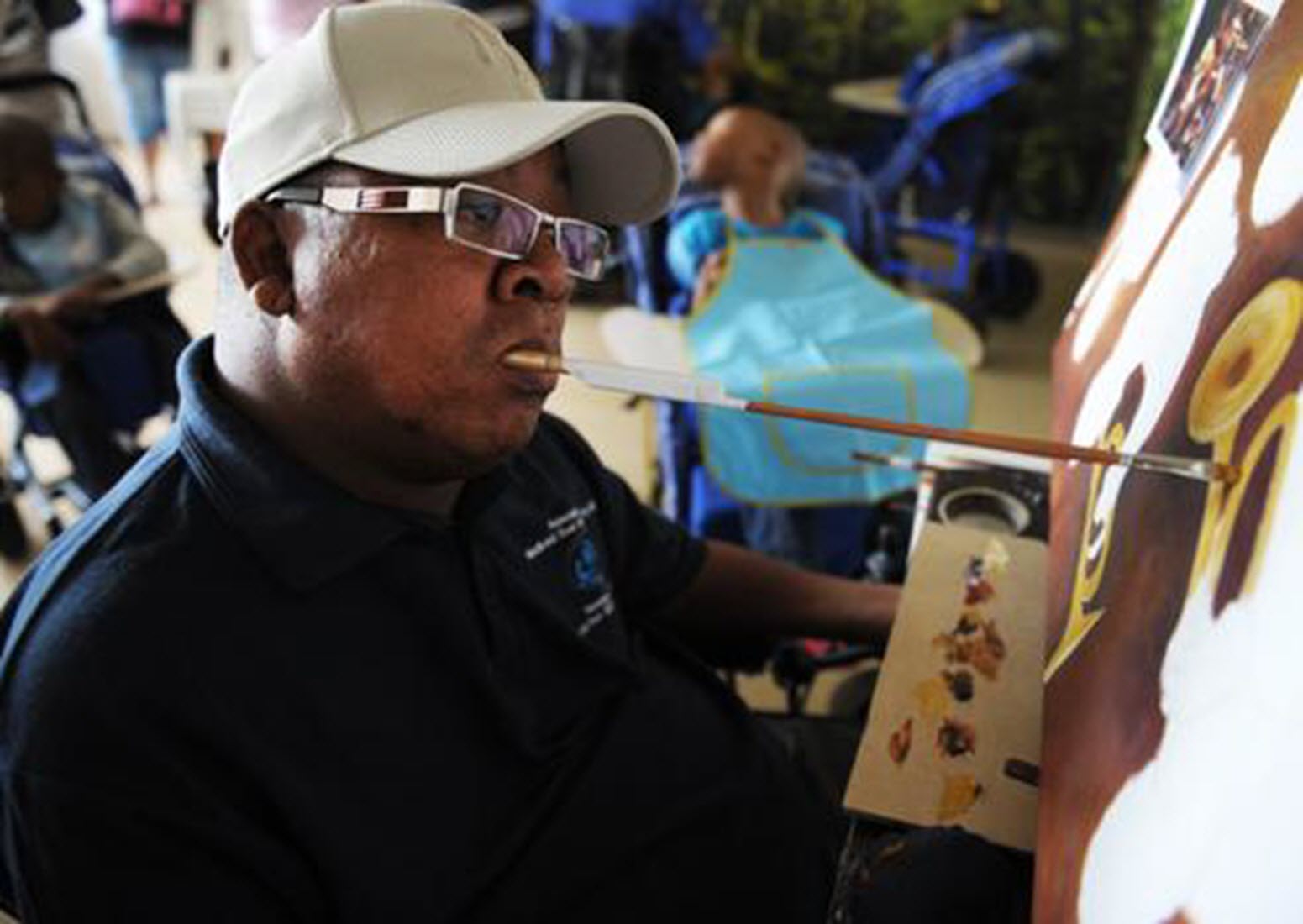 quadriplegic mouthpainter creates art