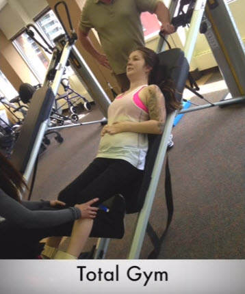 quadriplegic uses a total gym to workout