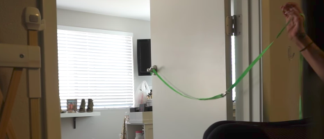 Picture of steph closing door with dog leash