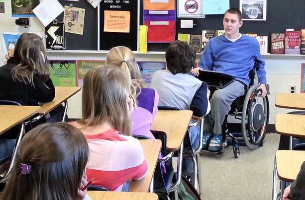 quadriplegic talks to a high school class