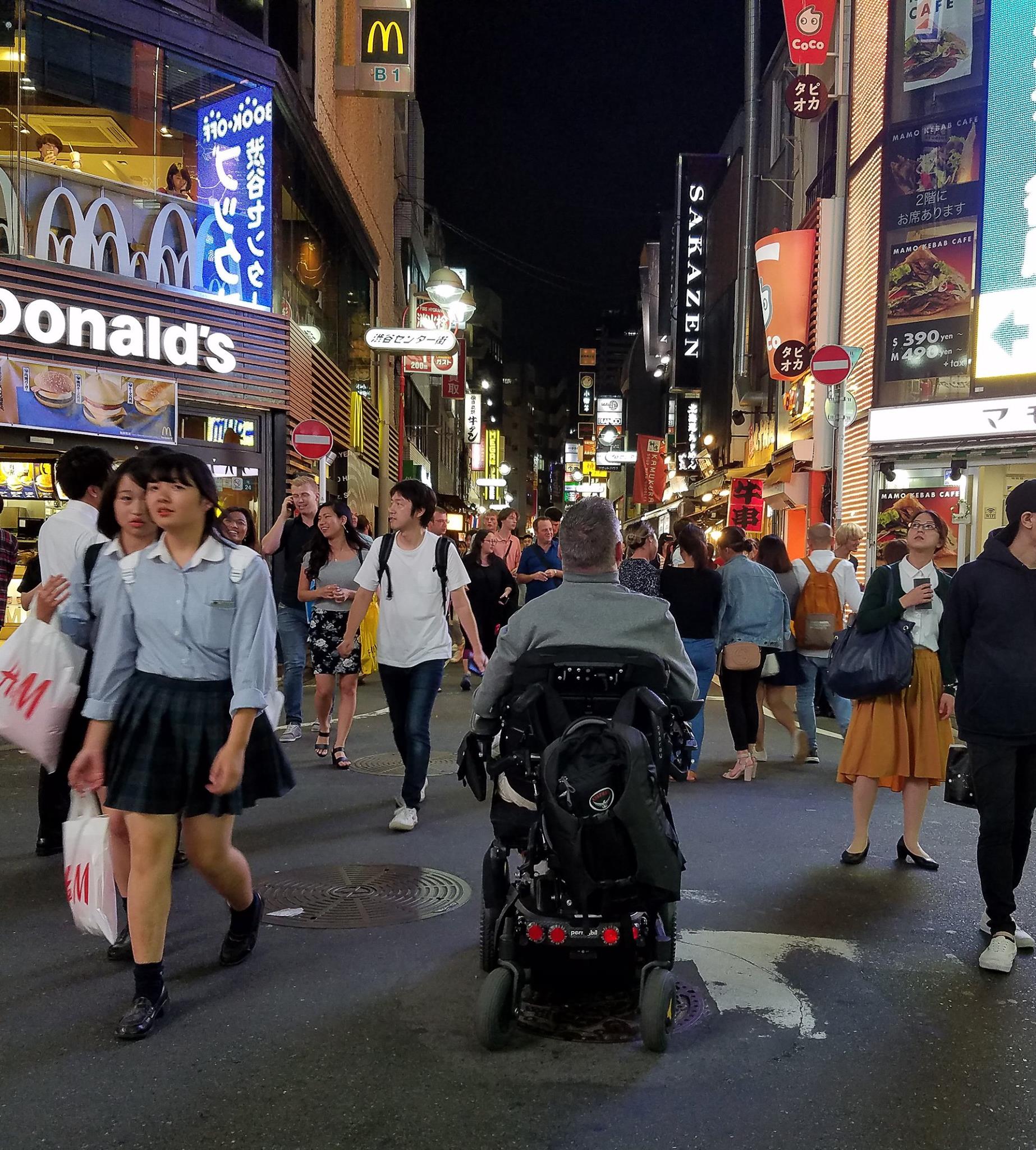 quadriplegic navigates the streets of Tokyo