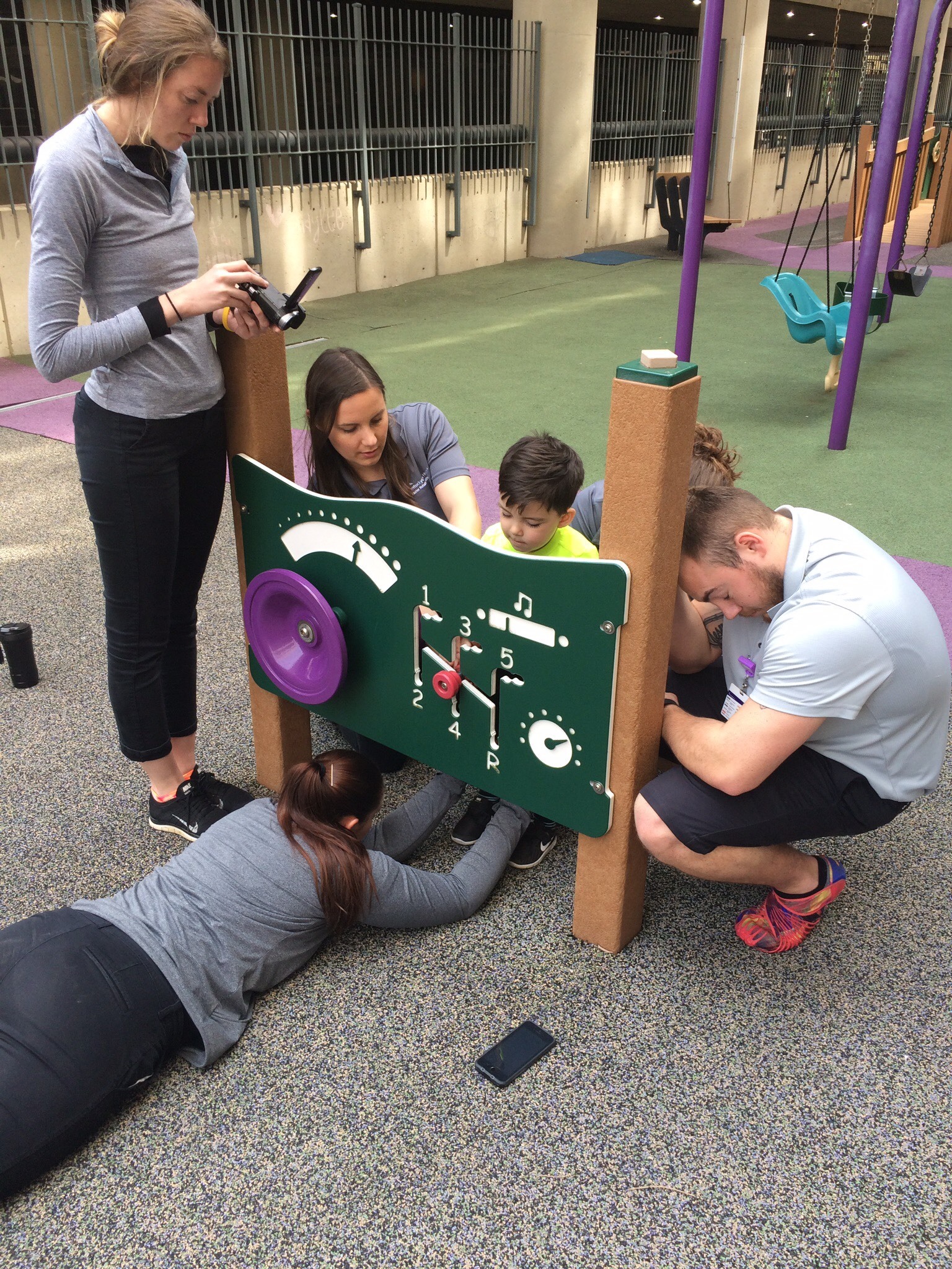 Nolan during therapy with team at Fraizer Institute