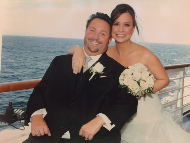 TJ and wife at their wedding