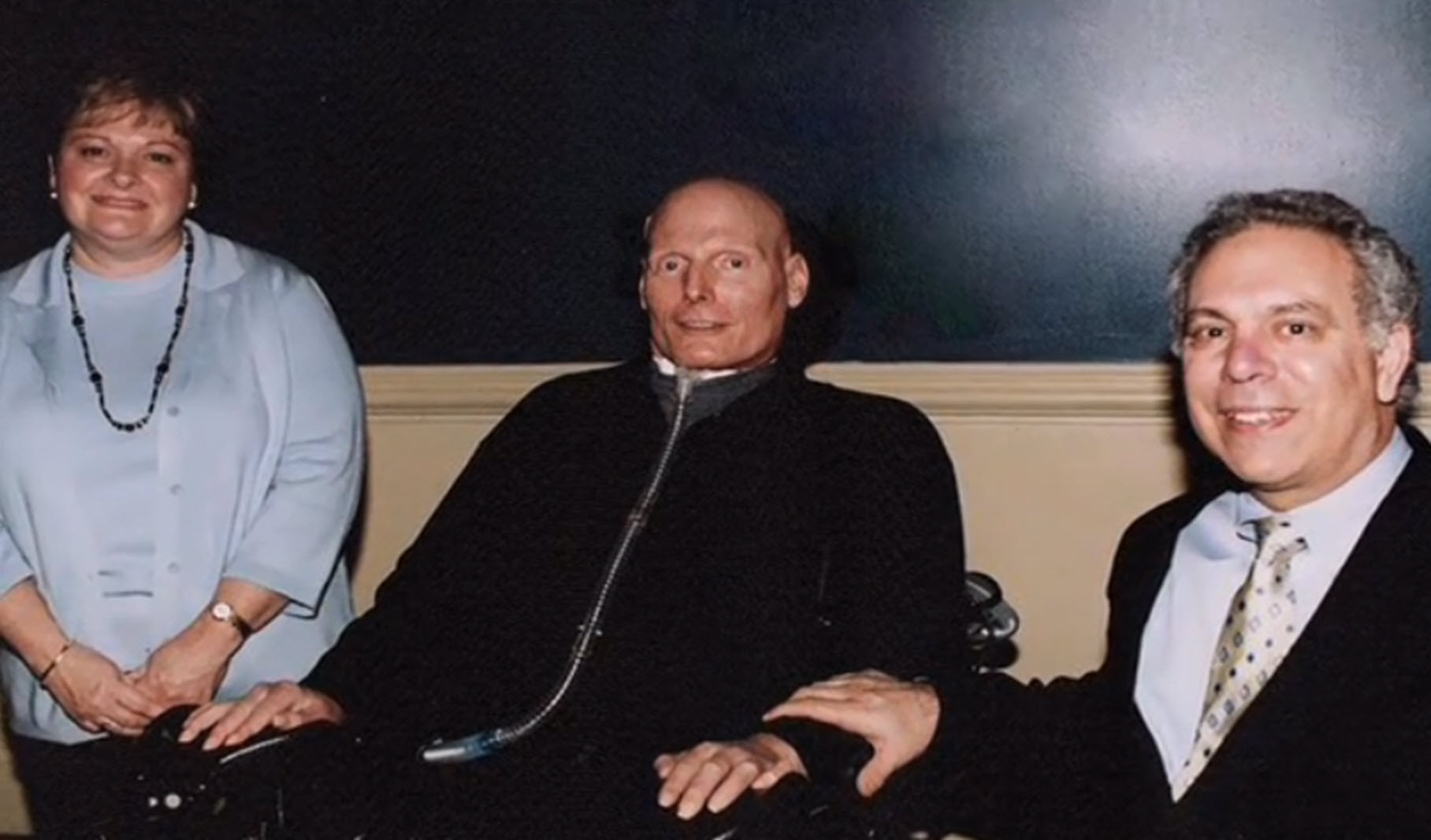 paraplegic Glenn Mangurian, his wife, and Christopher Reeve