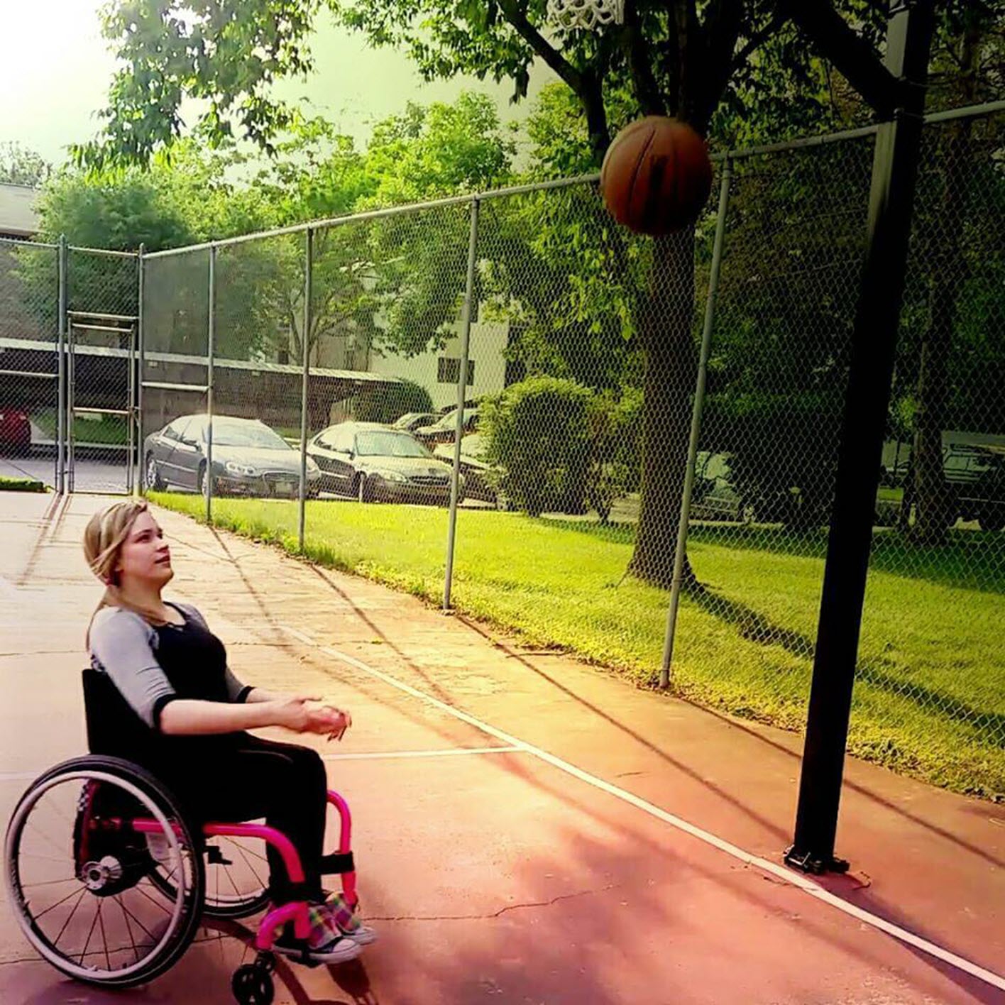wheelchair user on a basketball court