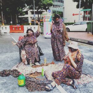 artists perform on a street