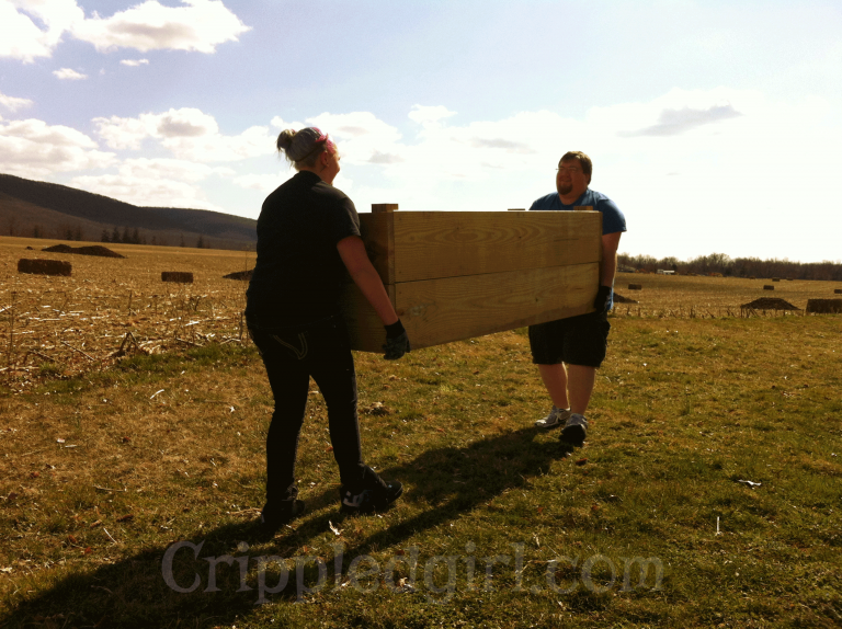 picture of jenn's family carrying box
