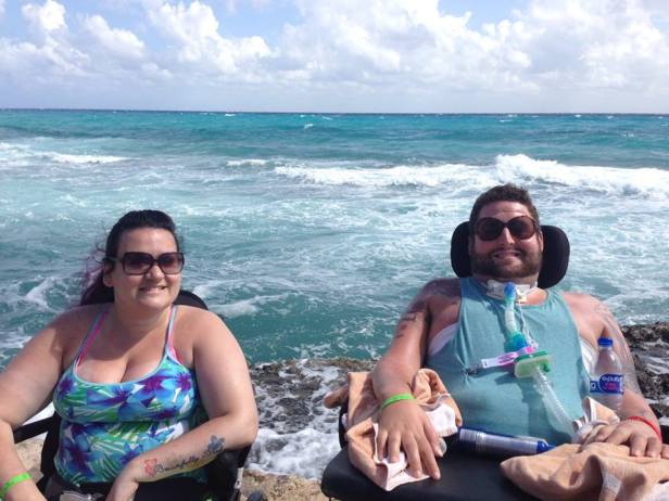 Drew and friend in front of ocean