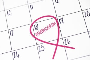Calendar with reminder for mammogram and Breast Cancer Awareness