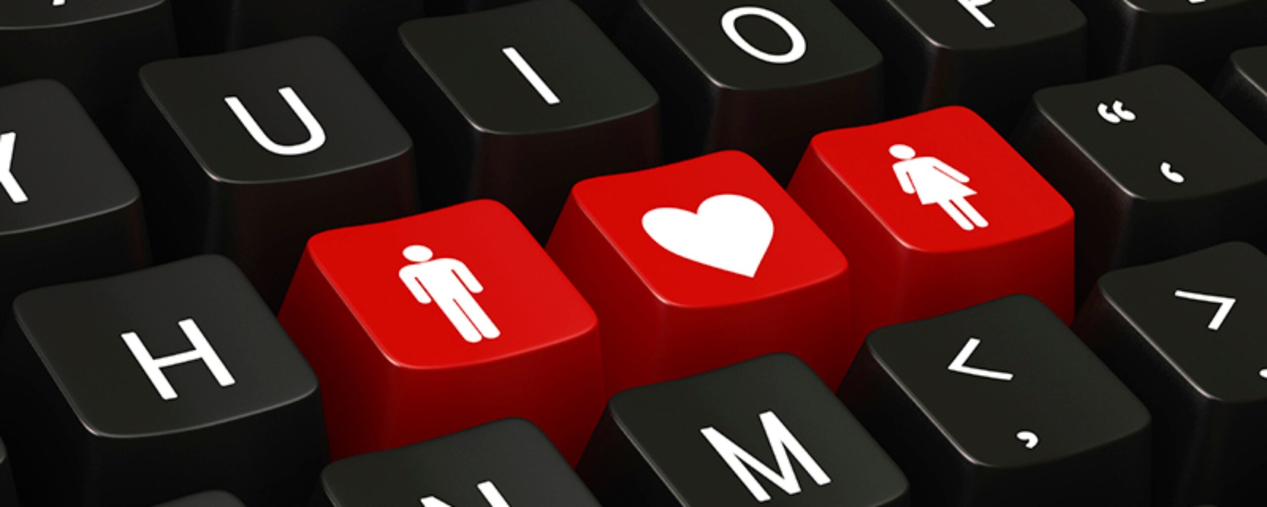 a keyboard with a man symbol, heart, and woman symbol