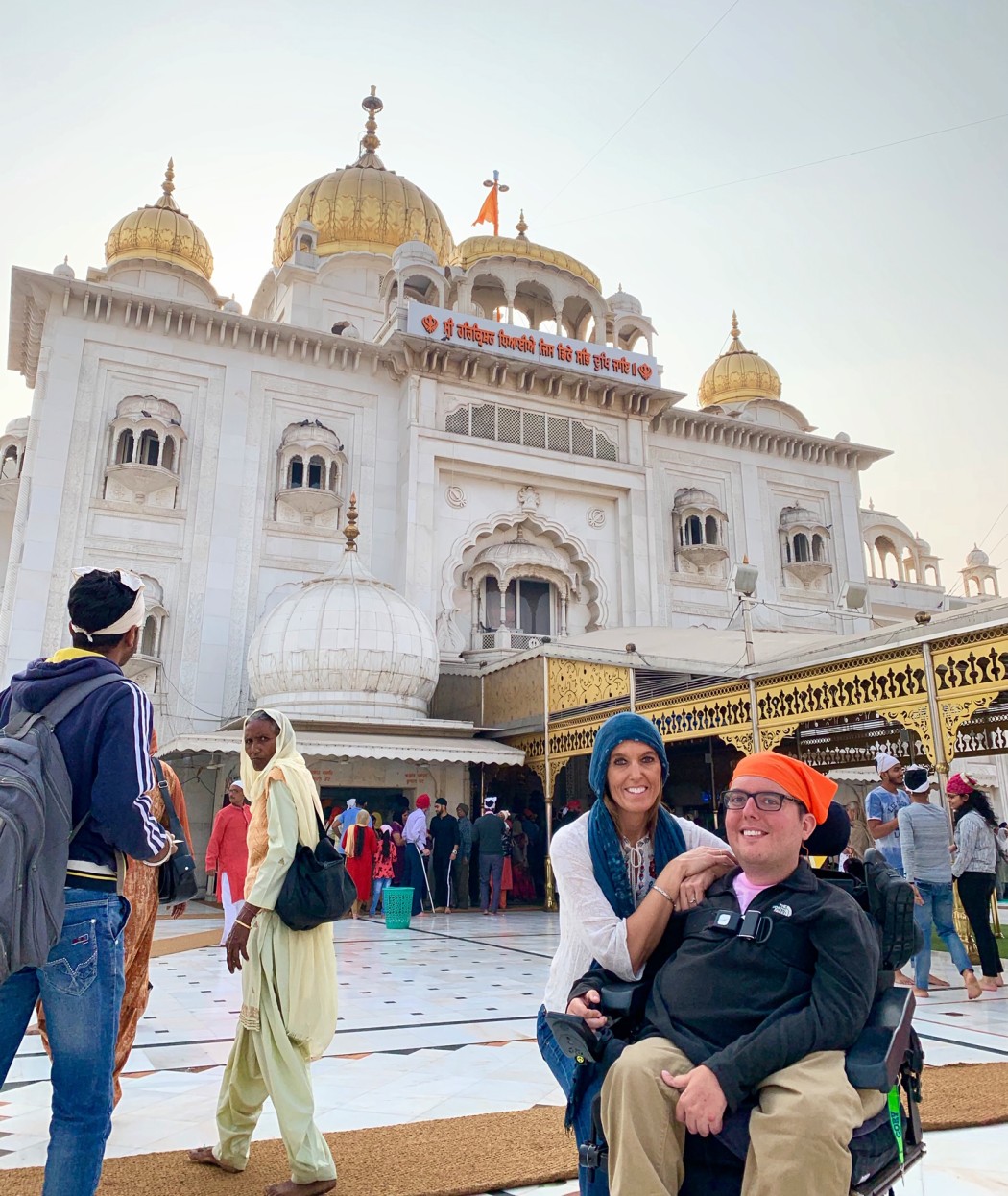 Cory and his mom in front of temple