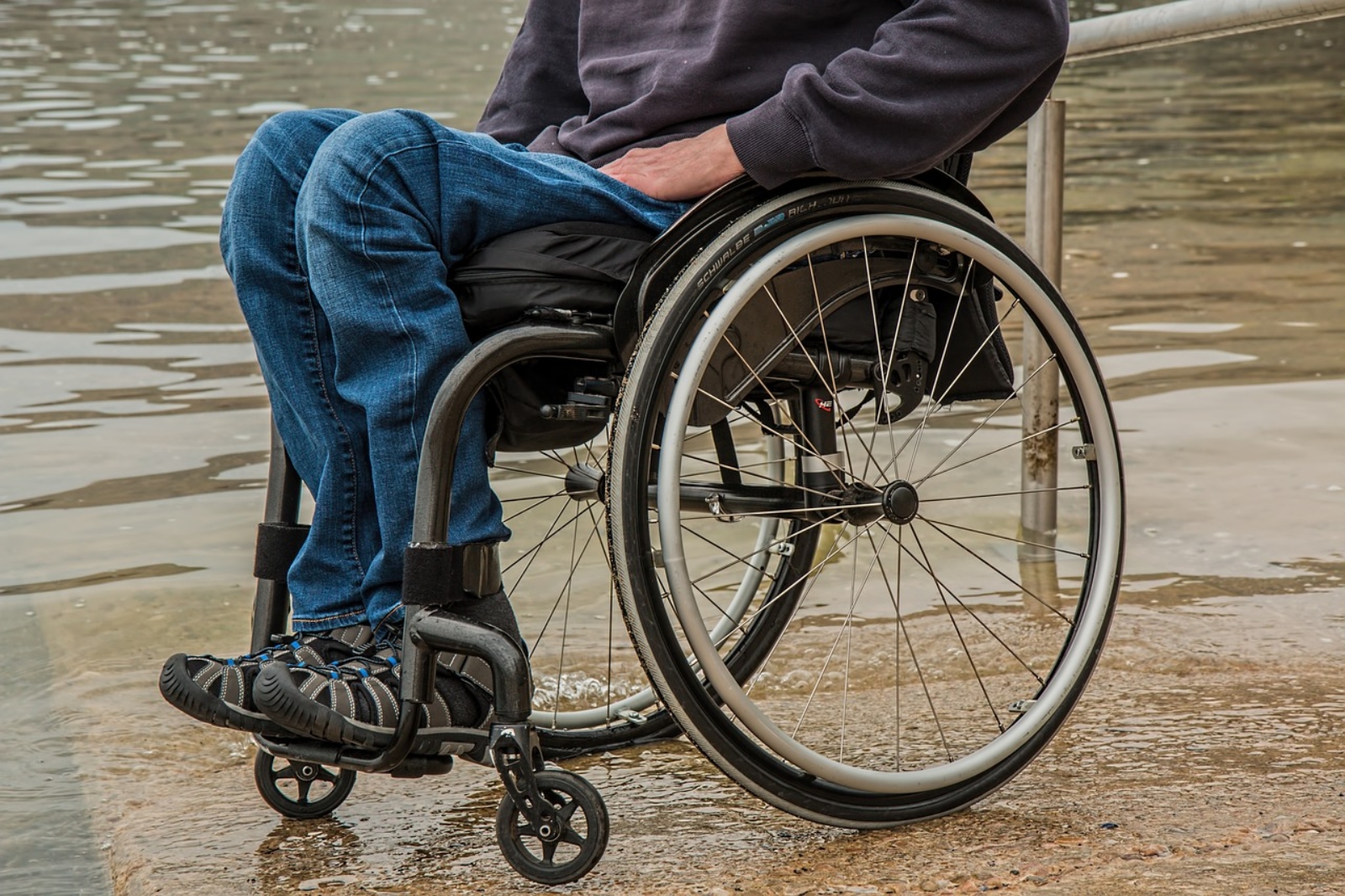 Man's legs sitting in a wheelchair