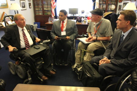 Congressman Jim Langevin( D-2nd RI), the Co-Chair of the Bipartisan Disabilities Caucus with George Gallego of our New York Chapter, Finn Bullers, of our Kansas chapter and Joe Gaskins of United Spinal Association ––at Roll on Capitol Hill 2014.