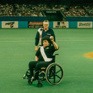Elaine throwing out the first pitch at a baseball game