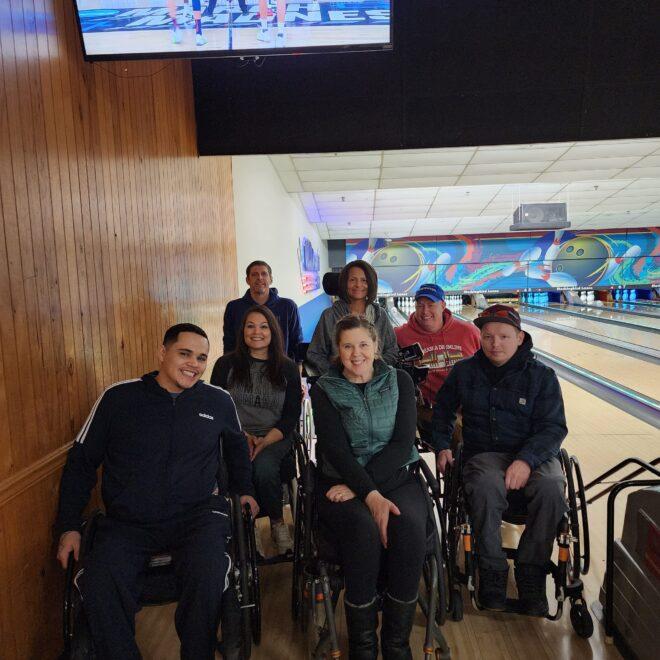 NE Chapter members group photo at bowling alley