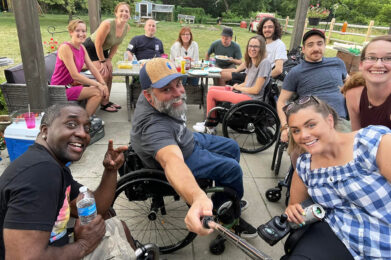 Group selfie of wheelchair users