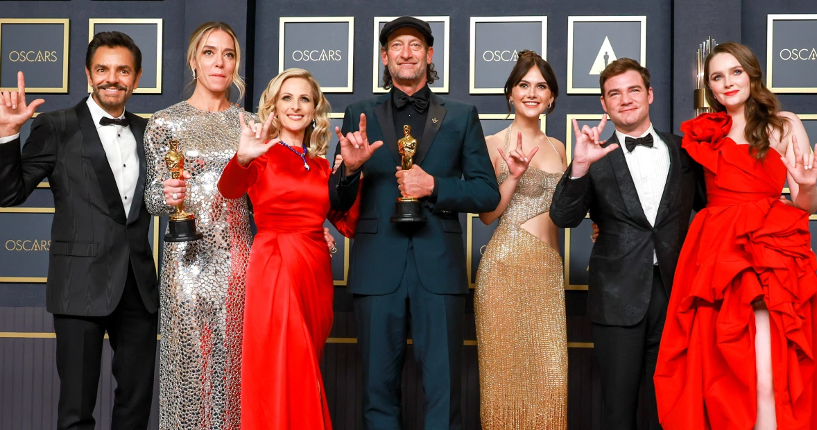 cast of CODA at Academy Awards holding Best Picture Oscar