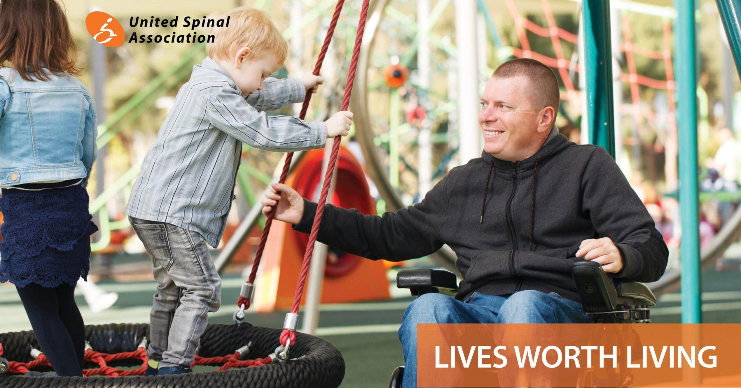 man in wheelchair pushing a child in a tire swing.