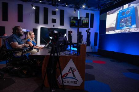 Rhonel Cinous, a black man and power chair user, during the Artemis I mission at NASA