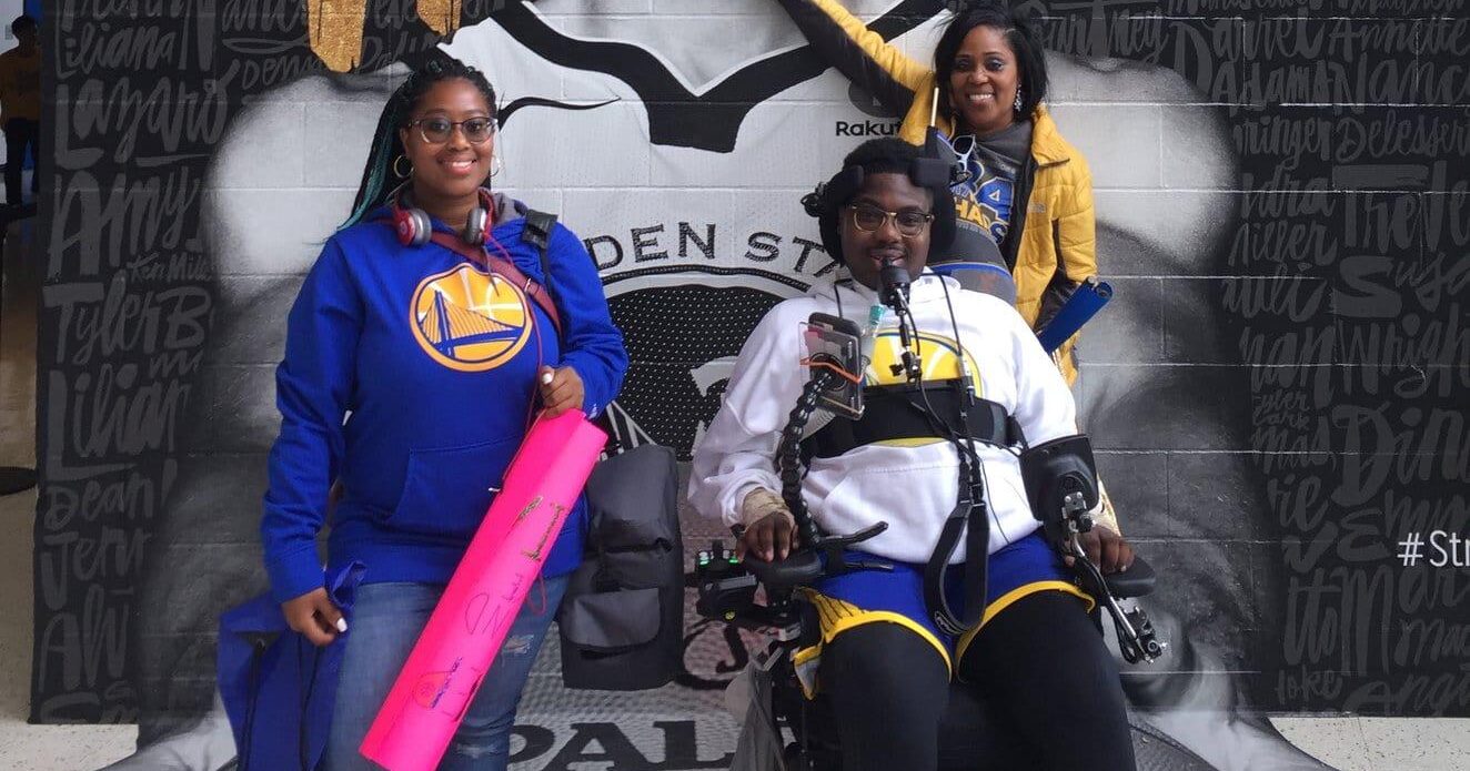 quadriplegic and vent user Nathaniel Foster Jr. surrounded by his family