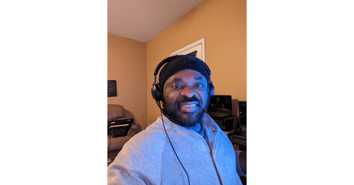 Jequ Okeke, a United Spinal member, smiles in a selfie