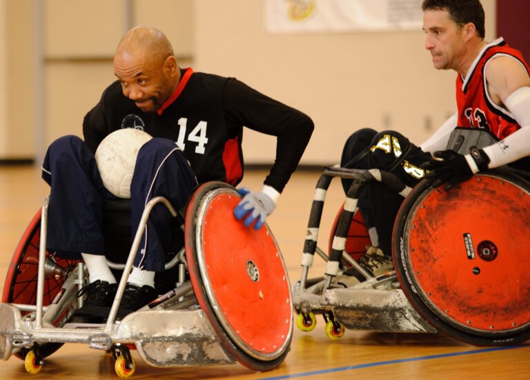 two men playing wheelchair rugby